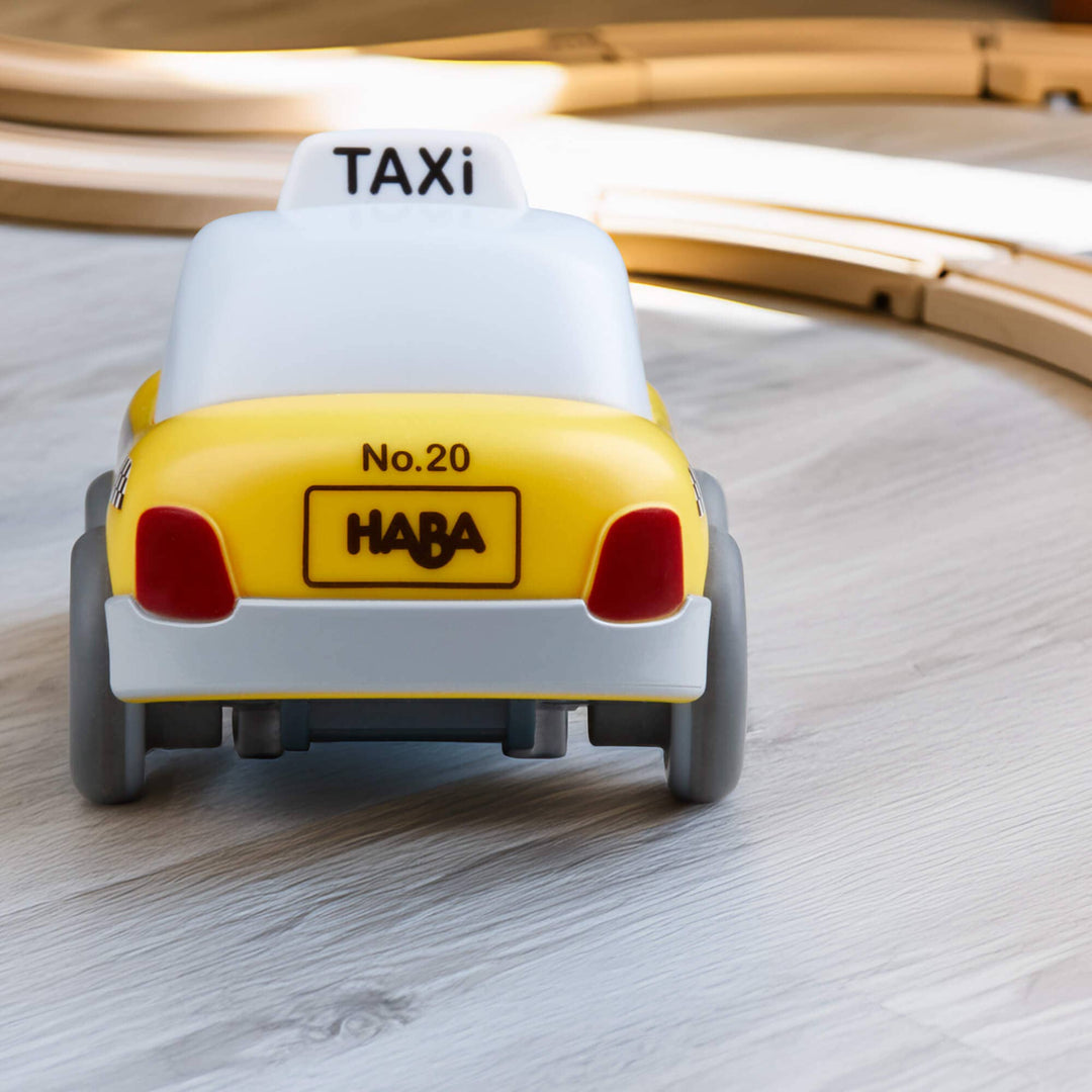 HABA Cars Taxi with Momentum Motor